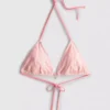 Top de bikini triangular con estampado de estrellas de mar a rayas