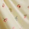 Top de pijama tipo camisola con estampado floral y tejido acanalado