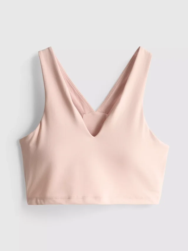 Top deportivo corto con cuello en V