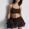Top deportivo corto con espalda nadadora y estampado de leopardo