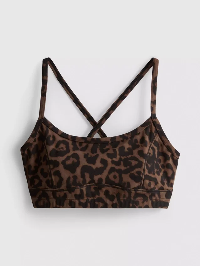 Top deportivo corto con espalda nadadora y estampado de leopardo
