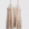 Top largo de encaje transparente tipo camisola