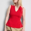 Top sin mangas con peplum y cuello en V