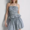 Top tipo camisola con peplum de cuadros vichy fruncido