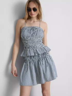 Top tipo camisola con peplum de cuadros vichy fruncido