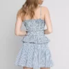 Top tipo camisola con peplum de cuadros vichy fruncido