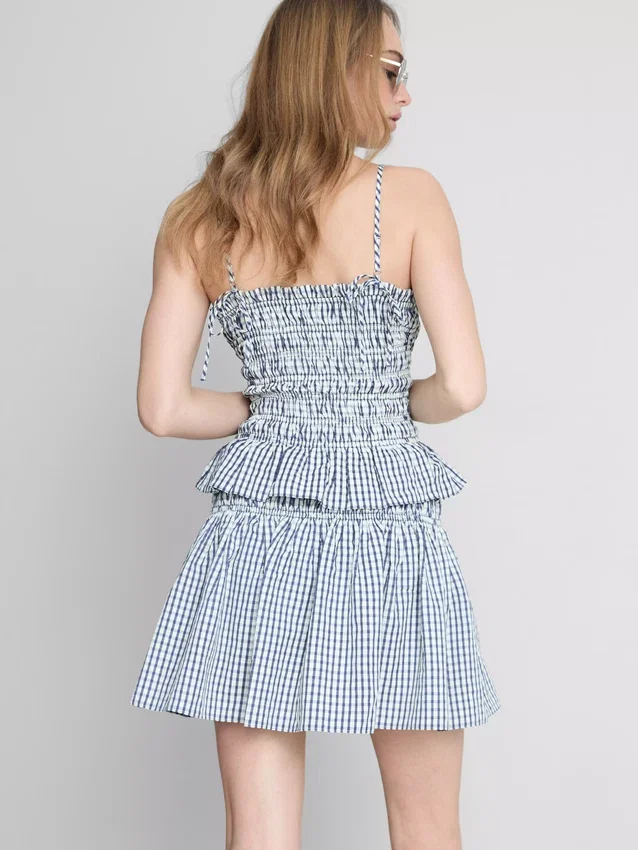 Top tipo camisola con peplum de cuadros vichy fruncido