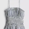 Top tipo camisola con peplum de cuadros vichy fruncido