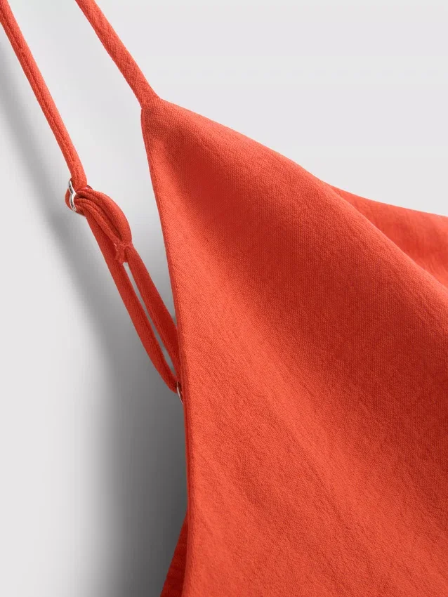 Top tipo camisola con textura y ventilación