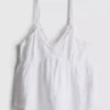 Top tipo camisola con volantes tejidos, ideal para relajarse