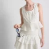Top tipo camisola corto de algodón con calados