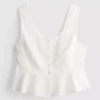 Top tipo camisola corto de algodón con calados