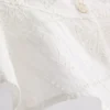 Top tipo camisola corto de algodón con calados