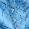 Top tipo camisola corto de algodón con calados