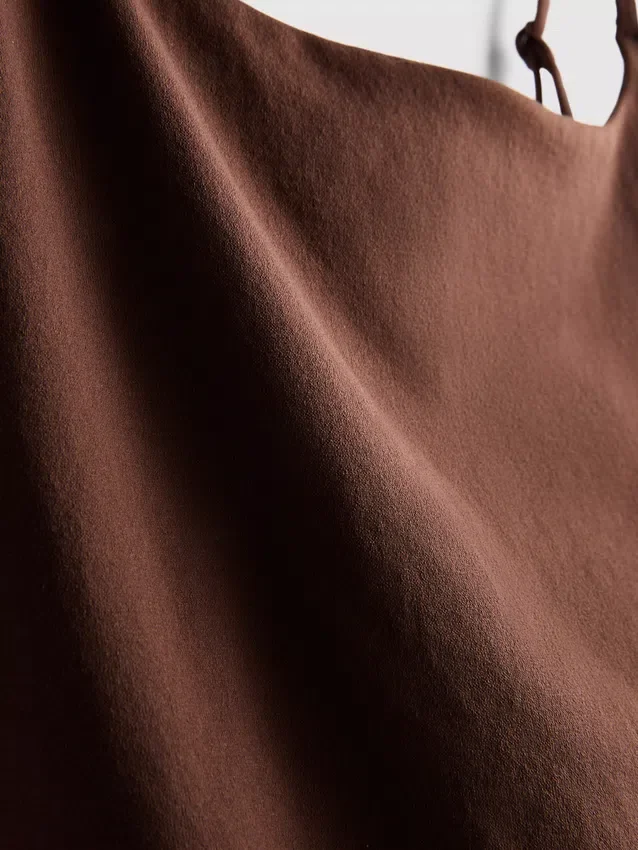 Top tipo camisola corto sin costuras