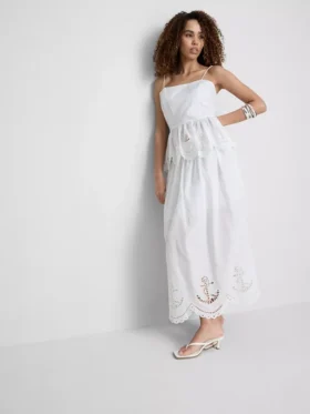 Top tipo camisola de algodón con bordado y dobladillo con volantes