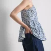 Top tipo camisola de algodón con calados