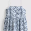 Top tipo camisola de algodón con calados