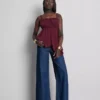 Top tipo camisola de algodón con dobladillo en forma de pañuelo