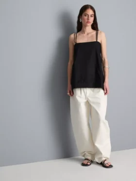 Top tipo camisola de algodón con dobladillo en forma de pañuelo