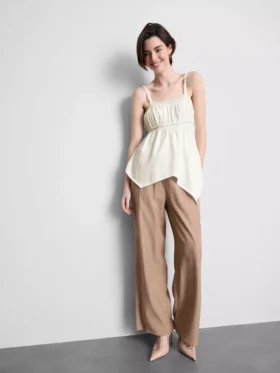 Top tipo camisola de algodón con dobladillo en forma de pañuelo