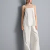 Top tipo camisola de algodón con dobladillo en forma de pañuelo