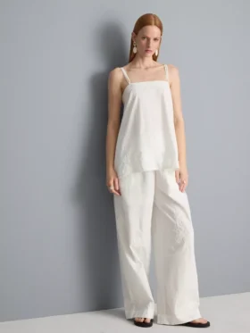 Top tipo camisola de algodón con dobladillo en forma de pañuelo