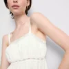 Top tipo camisola de algodón con dobladillo en forma de pañuelo