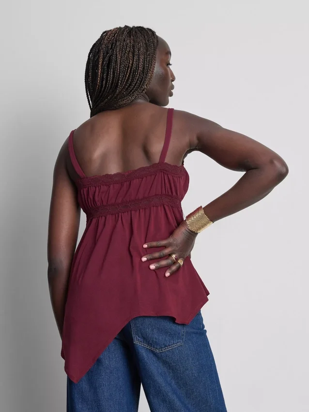 Top tipo camisola de algodón con dobladillo en forma de pañuelo