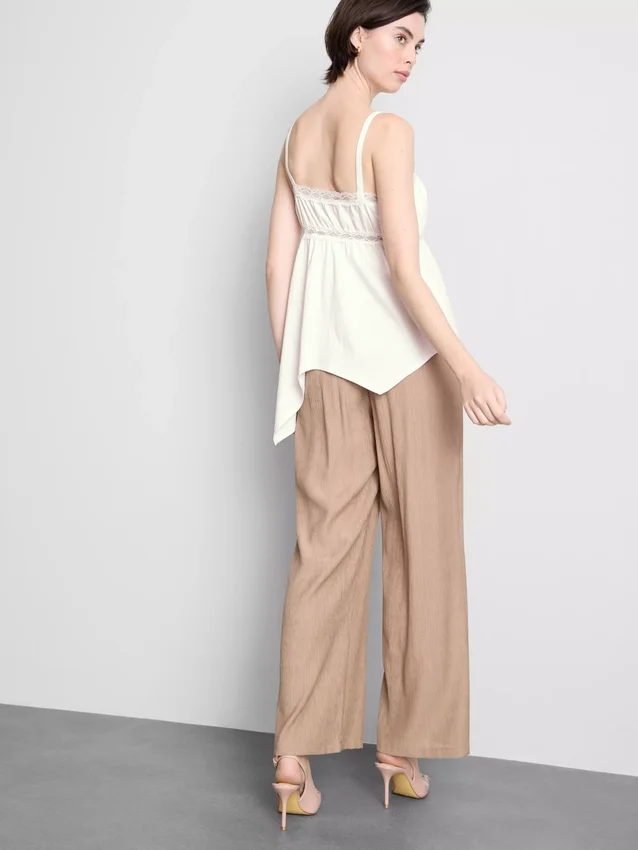 Top tipo camisola de algodón con dobladillo en forma de pañuelo