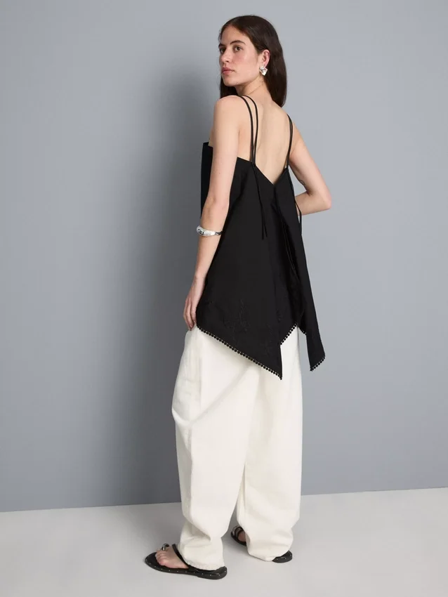 Top tipo camisola de algodón con dobladillo en forma de pañuelo