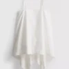 Top tipo camisola de algodón con dobladillo en forma de pañuelo