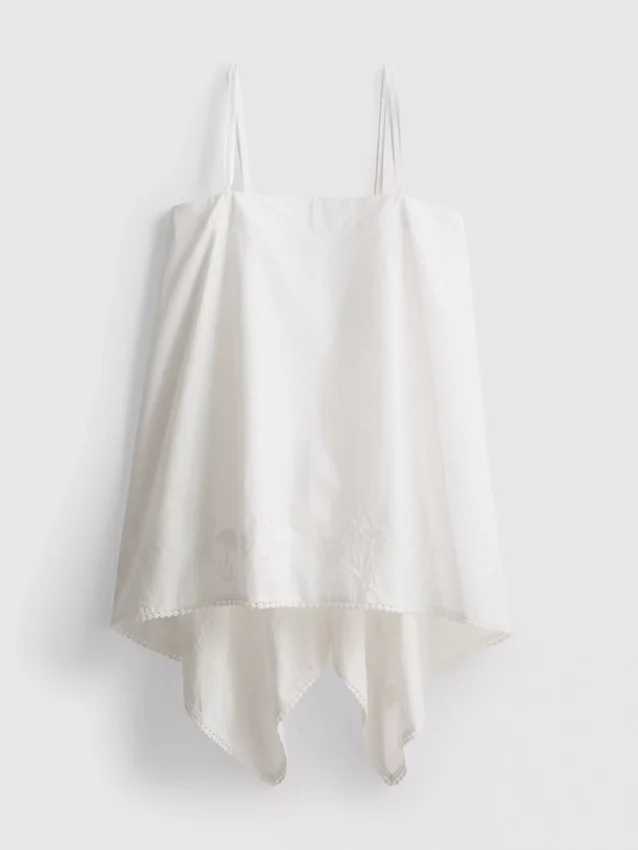 Top tipo camisola de algodón con dobladillo en forma de pañuelo