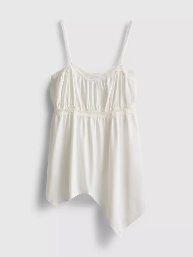 Top tipo camisola de algodón con dobladillo en forma de pañuelo