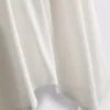 Top tipo camisola de algodón con dobladillo en forma de pañuelo