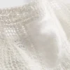 Top tipo camisola de croché con alto contenido de algodón