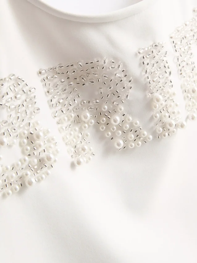 Traje de baño de novia con perlas
