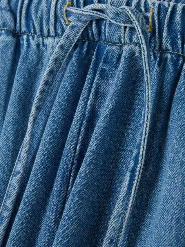 Vaqueros de mezclilla tipo sudadera de talle medio