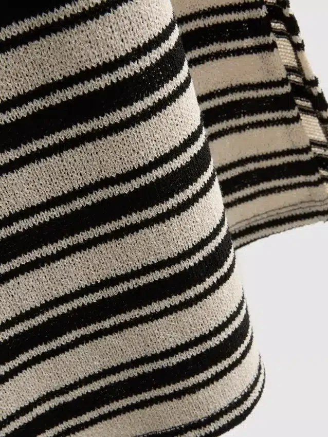 Vestido midi ajustado sin mangas de Paula Echevarría