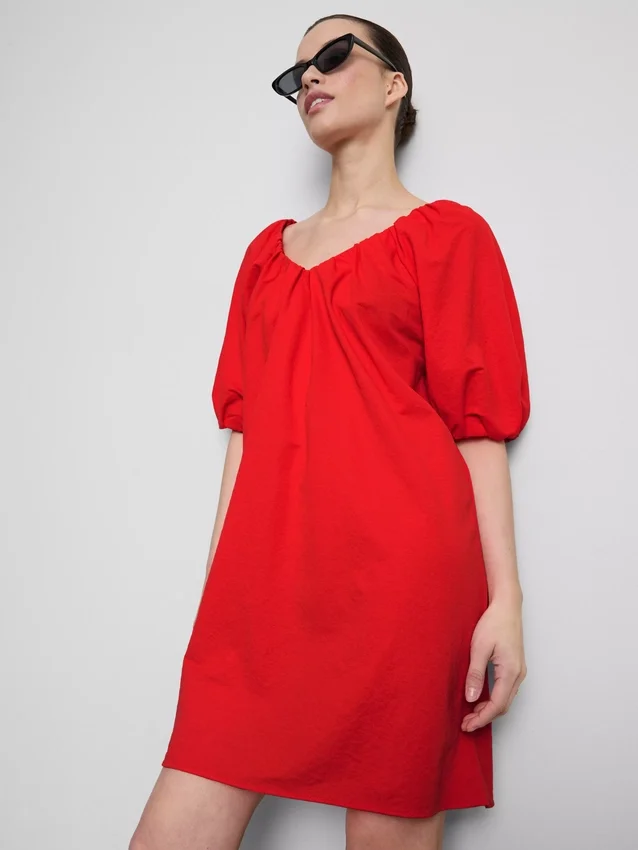 Vestido mini tipo smock con mangas abullonadas