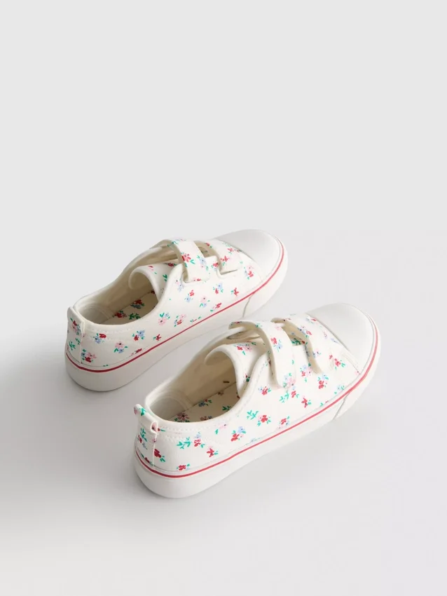 Zapatillas bajas de lona con estampado floral