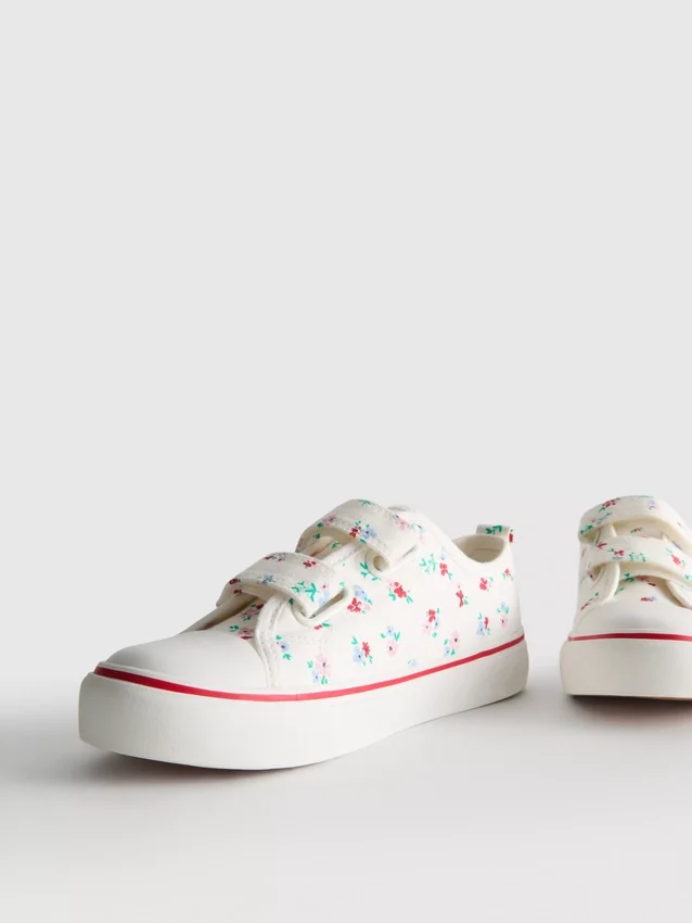 Zapatillas bajas de lona con estampado floral