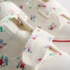Zapatillas bajas de lona con estampado floral