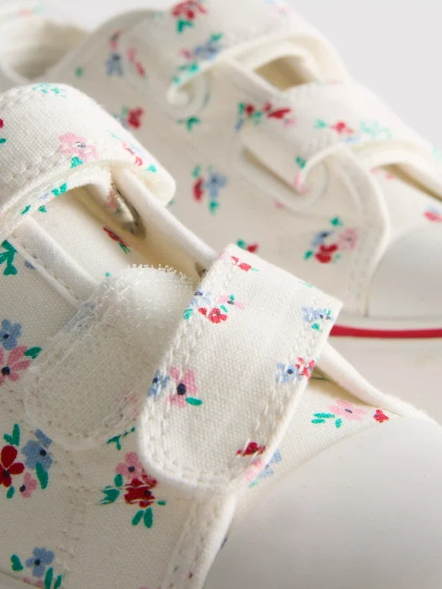 Zapatillas bajas de lona con estampado floral