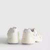 Zapatillas de suela gruesa con detalles florales