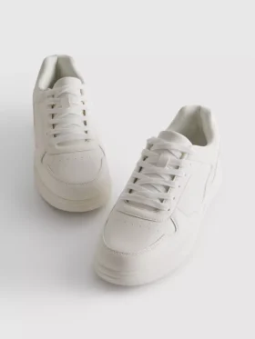 Zapatillas deportivas de caña baja con paneles