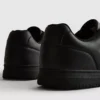 Zapatillas deportivas de caña baja con paneles