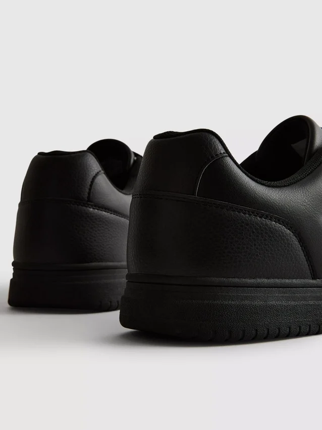 Zapatillas deportivas de caña baja con paneles