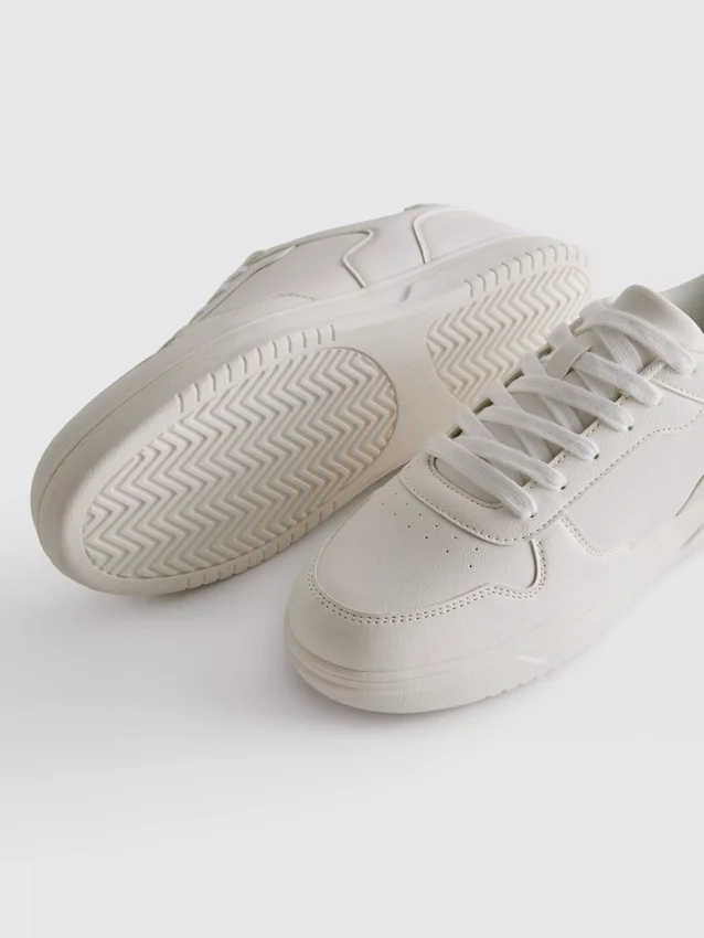 Zapatillas deportivas de caña baja con paneles