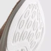 Zapatillas sin cordones con detalles de diamantes
